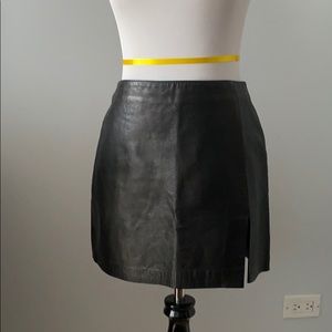 Black leather mini skirt